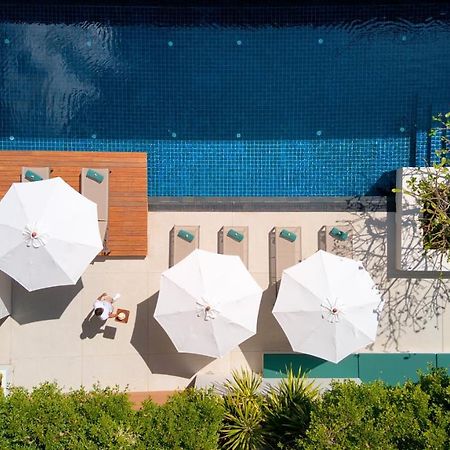 Outrigger Surin Beach Resort - Sha Extra Plus Exterior foto The pool at the Beverly Hills Hotel