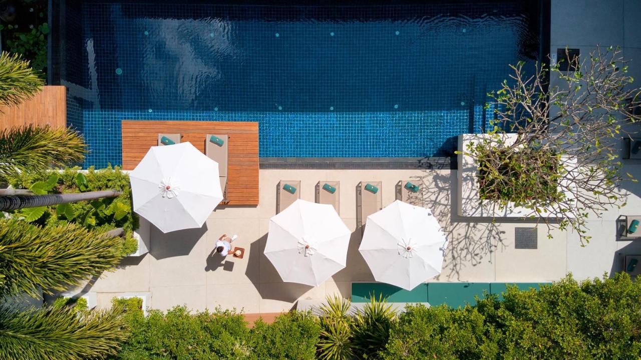 Outrigger Surin Beach Resort - Sha Extra Plus Exterior foto The pool at the Beverly Hills Hotel