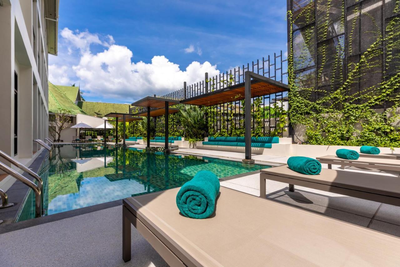 Outrigger Surin Beach Resort - Sha Extra Plus Exterior foto The swimming pool at the hotel